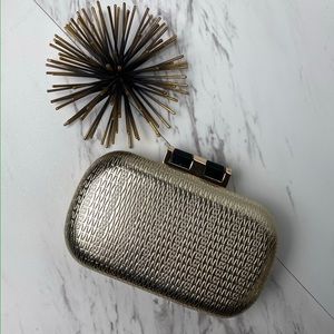 Gold clutch